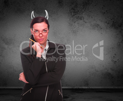 Devil Horns Drawn on Head of Red Faced Young Adult Woman
