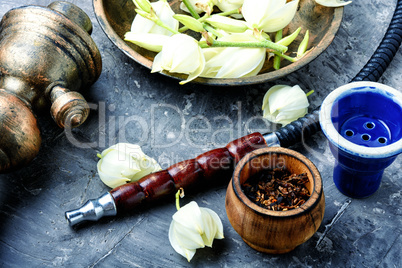 Smoking pipe and floral tobacco