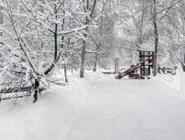 city park after snowfall at day