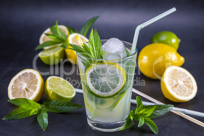 Cold refreshing summer lemonade with mint in a glass