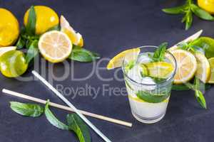 Top view of fresh lemonade with mint in glasses