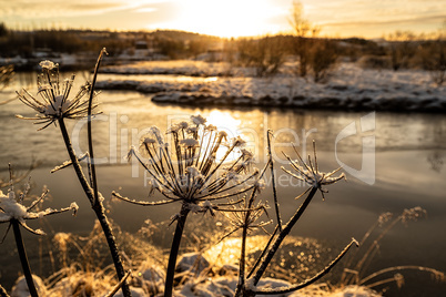 Sunset in Heidmork lake, Iceland