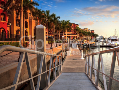 Sunset over the boats in Esplanade Harbor Marina in Marco Island