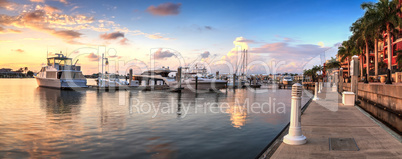 Sunset over the boats in Esplanade Harbor Marina in Marco Island