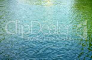 ripple on water in city park pond