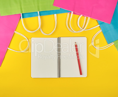 open notebook with blank white sheets