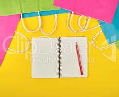 open notebook with blank white sheets