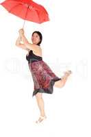 Chinese woman frying with a red umbrella