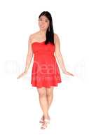 Happy Asian woman in a red short dress smiling