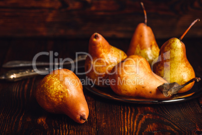 Few Golden Pears on Table.