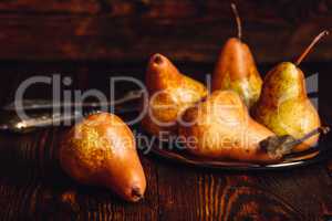 Few Golden Pears on Table.