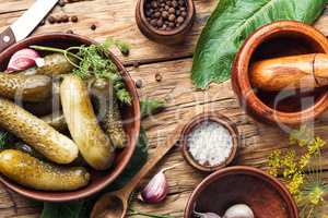 Homemade Pickles On Wooden Table