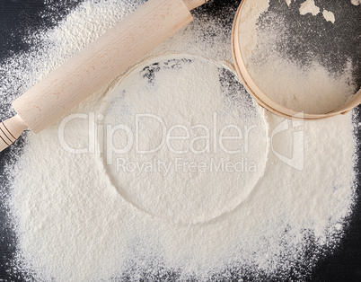 sprinkled white flour, round imprint from sieve