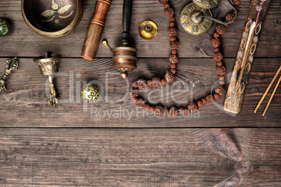 Copper singing bowl, prayer beads, prayer drum and other Tibetan