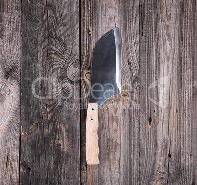 steel knife for cutting meat with a wooden handle