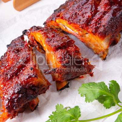 BBQ spare ribs from a charcoal grill