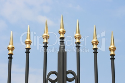 Gilded iron spikes