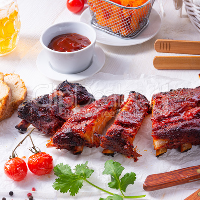 BBQ spare ribs from a charcoal grill