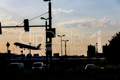 plane and traffic lights at evening