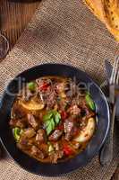 classic beef goulash with peppers and onions