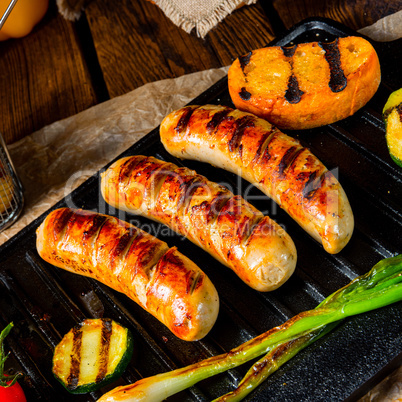 Delicious  grilled sausage with various grilled vegetables