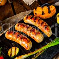 Delicious  grilled sausage with various grilled vegetables