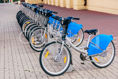 Parked Urban Bicycles on Rental Station.