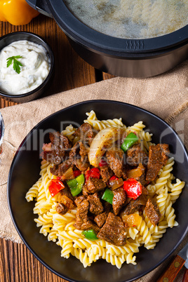 Fussili noodle with klaschise spicy goulash and paprika