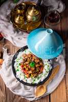 Tajin beef stew with rice paprika and sesame seeds