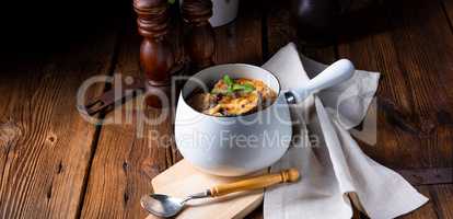 Veal goulash with baked aubergine and herbs