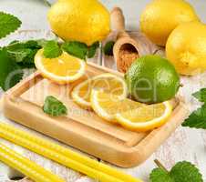 lemons and lime, brown sugar and a bunch of fresh mint