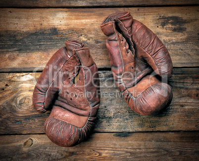 very old leather brown boxing gloves