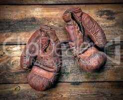 very old leather brown boxing gloves