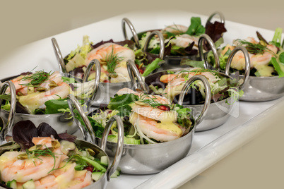 Shrimp, spring greens, pomegranate salad with citrus dressing