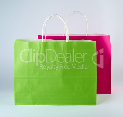 rectangular pink and green  paper shopping bags with a handle