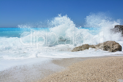 Summer on a beach, windy day, big waves