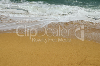 Rolling waves over golden sand, Sithonia, Greece