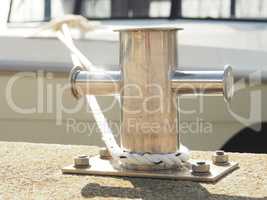 Stainless steel bollard with a rope