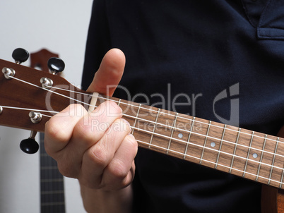 Playing an ukulele
