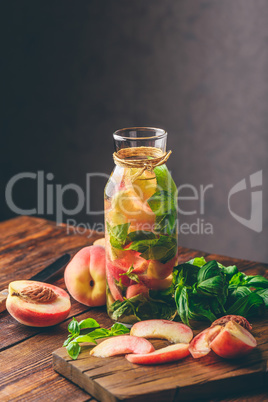 Detox Water with Peach and Basil.