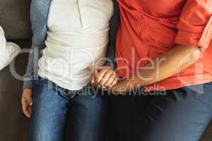 Mother consoling her son in the lobby at hospital