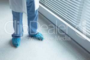 Male doctor standing in hospital