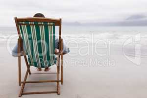 Man relaxing on a beach chair at beach