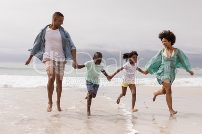 Family having fun together on the beach