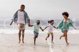 Family having fun together on the beach