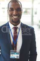 African-american businessman standing in conference room