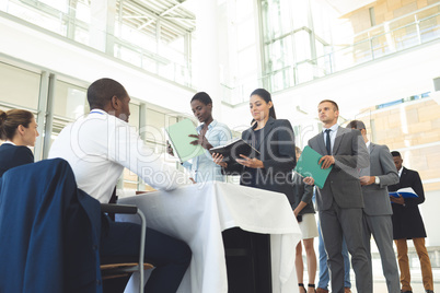 Group of diverse business people queuing up for interview
