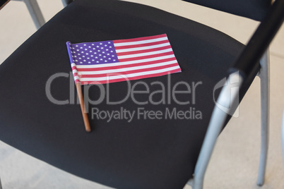 American flag on chair in conference room