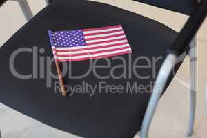 American flag on chair in conference room