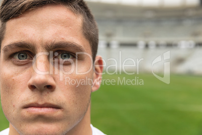 Caucasian Rugby player looking at camera in the stadium